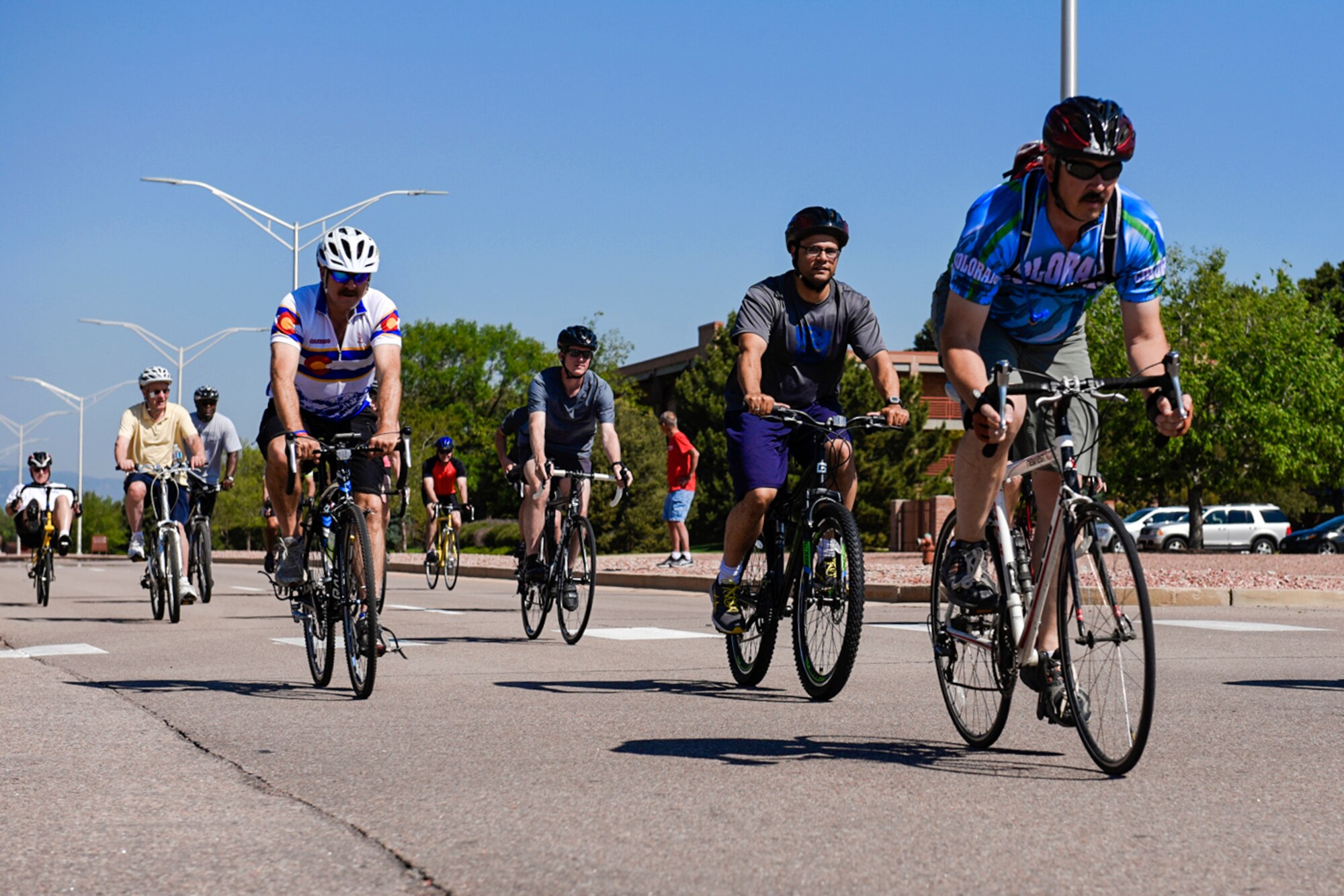 PETERSON AIR FORCE BASE, Colo. – Peterson Airmen take off at the beginning of the 10k bike course during the annual Sports and Field Day at Peterson Air Force Base, Colo., June 16, 2016. Events began at 8 a.m. and were scattered throughout the day, ending at 2 p.m. (U.S. Air Force photo by Senior Airman Rose Gudex)