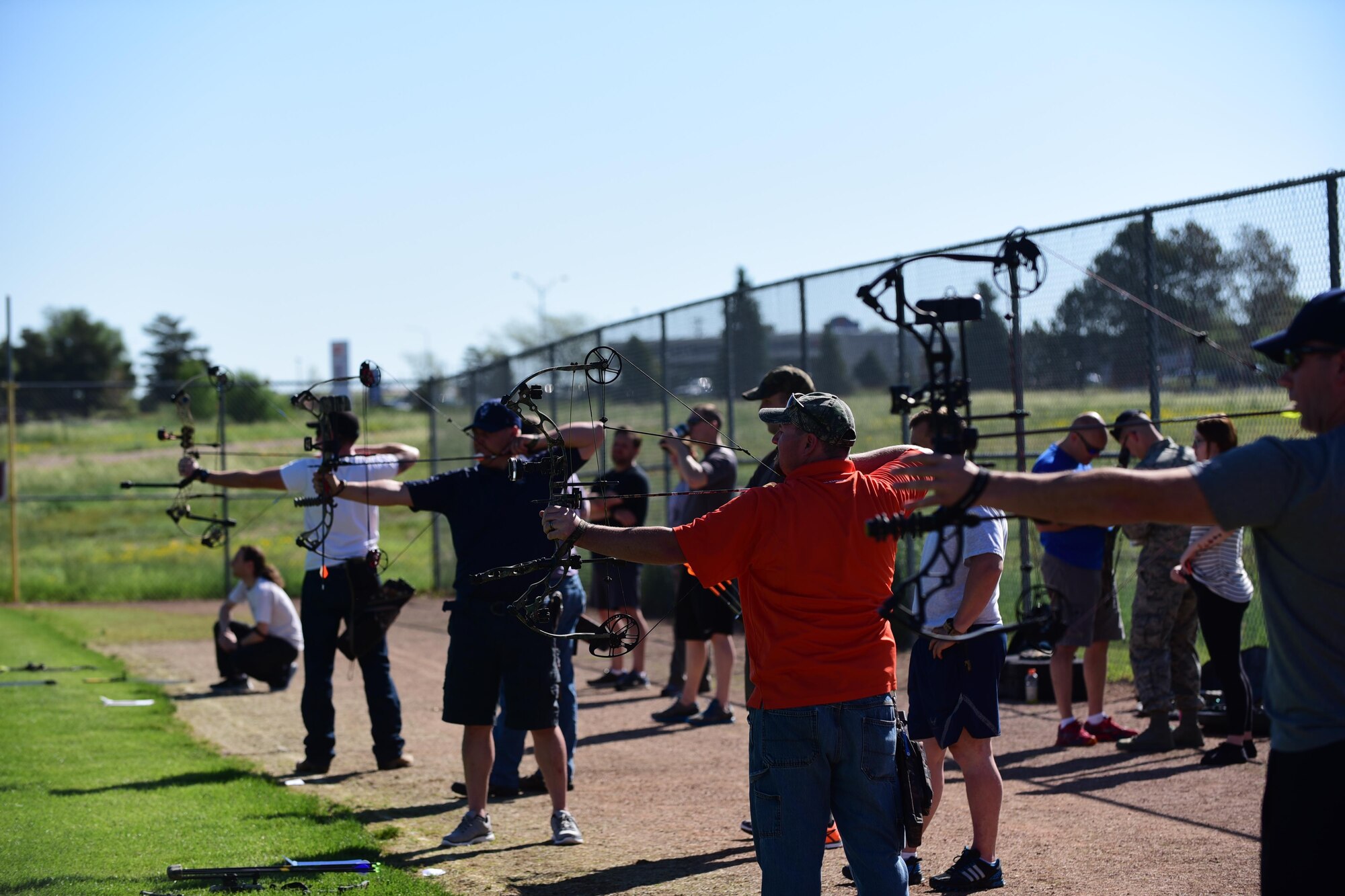 PETERSON AIR FORCE BASE, Colo. – Archers take aim during the archery competition portion of the annual Sports and Field Day at Peterson Air Force Base, Colo., June 16, 2016. Members of Team Pete had 27 different events to participate in ranging from Archery to Wallyball. (U.S. Air Force photo by Staff Sgt. Amber Grimm)