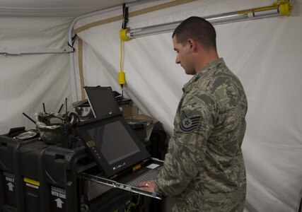 Fort A.P. Hill, Va. – Tech Sgt. Gregory Mackel, Cyber Operations Technician from the 910th Communications Squadron out of Youngstown, Ohio, reviews information during the Quartermaster Liquid Logistics Exercise 2016. Hailing from Johnstown, Pa., Mackel is part of an Air Force Reserve group that is providing communications support for the exercise. (U.S. Army photo by Sgt. James Bradford, 372nd Mobile Public Affairs Detachment)