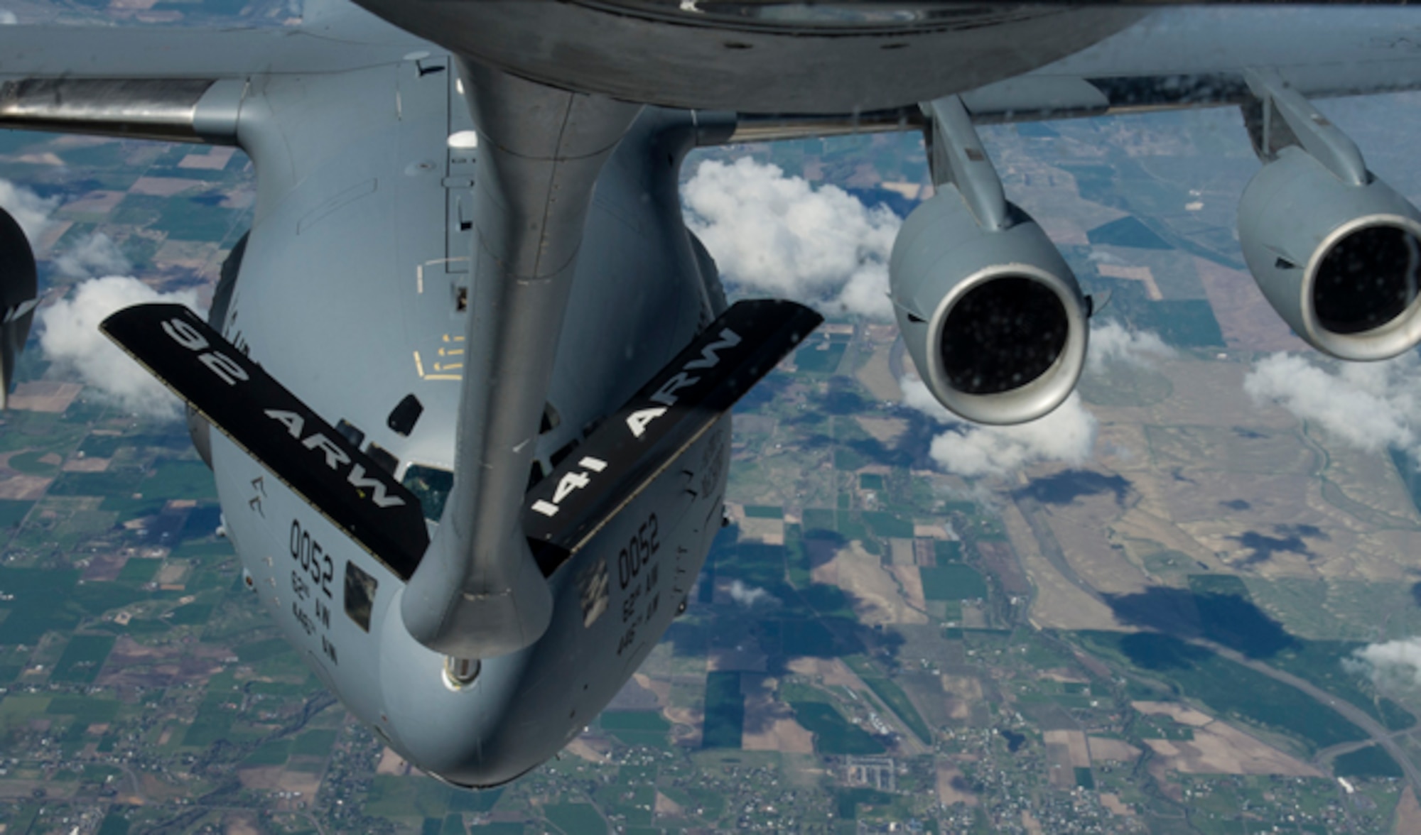 Lt. Col. Chad Marchesseault, the 92nd Operations Group deputy commander, flew a KC-135 Stratotanker from Fairchild Air Force Base, Wash., during an air refueling exercise over Washington April 5, 2016. One of the receivers, a C-17 Globemaster hailing from Joint Base Lewis-McChord, Wash., was flown by Chad’s youngest brother, Capt. Lance Marchesseault, the 62nd Operations Support Squadron airlift director. (U.S. Air Force photo/Airman 1st Class Sean Campbell)