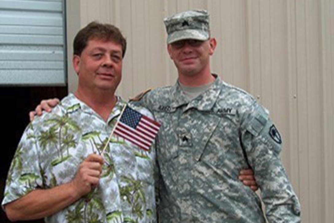 Army Sgt. Carl Rogers, S.C. Army National Guard, stands next to his father Alfred before his second deployment to Afghanistan in 2009.  Rogers said his father is his role model.
