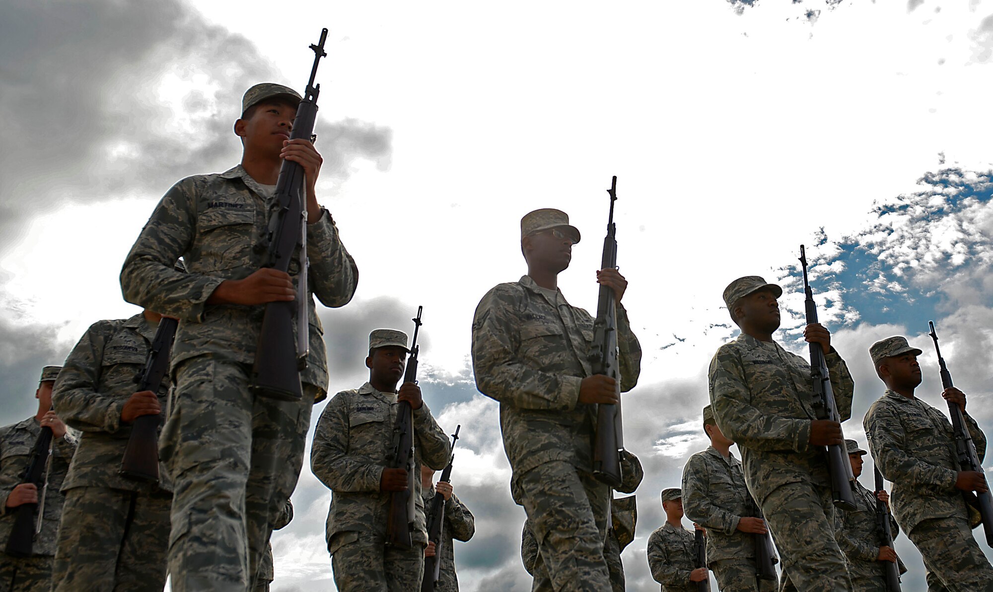 U.S. Airmen assigned to the 20th Force Support Squadron Honor Guard perform an open ranks with rifle sling inspection at Shaw Air Force Base, S.C., June 16, 2016. Honor guardsmen are examined for uniform deficiencies, along with effectiveness in handling ceremonial rifles. (U.S. Air Force photo by Airman 1st Class Christopher Maldonado)