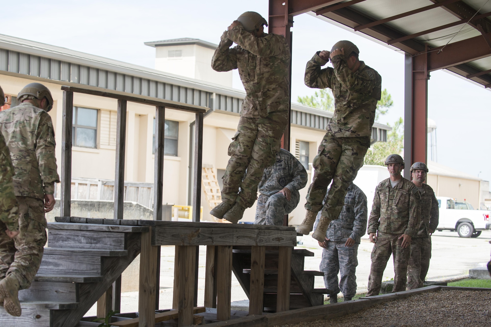 U.S. Air Force Airmen from the 93d Air Ground Operations Wing practice their jump maneuvers, June 16, 2016, at Moody Air Force Base, Ga. Airmen practiced landing techniques prior to the jump to prevent injuries. (U.S. Air Force photo by Airman Daniel Snider/Released)