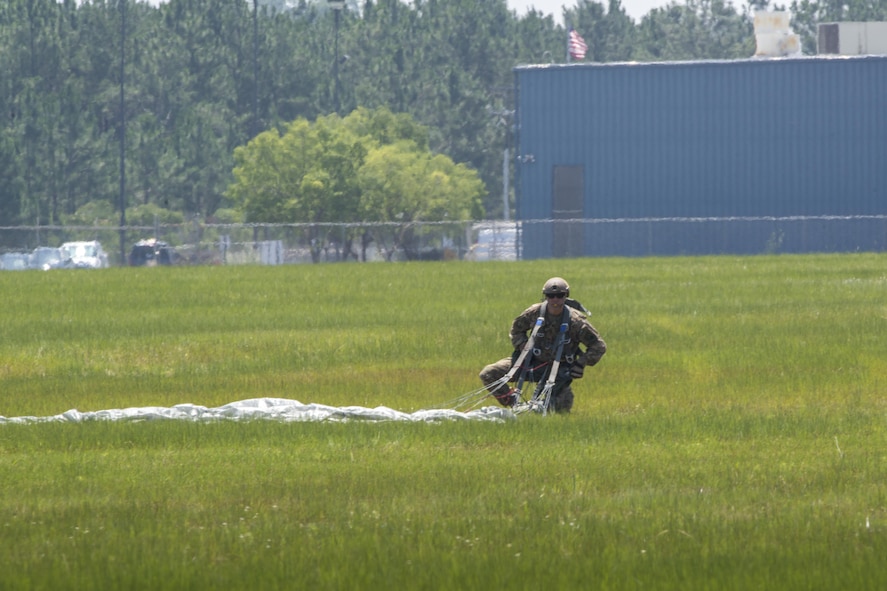 U.S. Air Force Col. Eric Trychon, 93d Air Ground Operations Wing vice commander, catches his breath after a static-line jump, June 17, 2016, at the Lee Fulp drop zone in Tifton, Ga. This was Trychon’s final jump as the 93d AGOW’s vice commander. (U.S. Air Force photo by Airman Daniel Snider/Released)