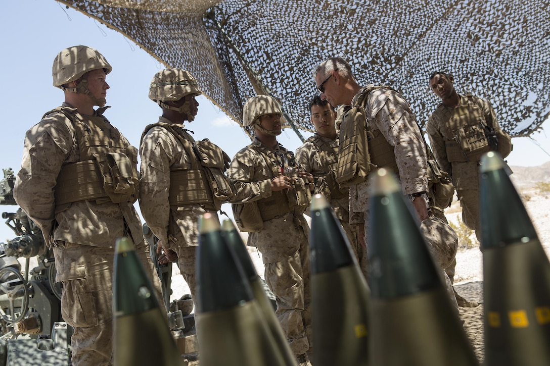 Lt. Gen. Rex C. McMillian, commander of Marine Forces Reserve, visits Marines from 3rd battalion, 14th Marine Regiment, 4th Marine Division, Marine Forces Reserve, while they complete their final exercise at Integrated Training Exercise 4-16 aboard Marine Corps Air Ground Combat Center Twentynine Palms, Calif., June 19, 2016. During the final exercise the Marines combined all of the elements of Marine Air Ground Task Force, to hone their skills and to ensure they are ready to deploy worldwide.