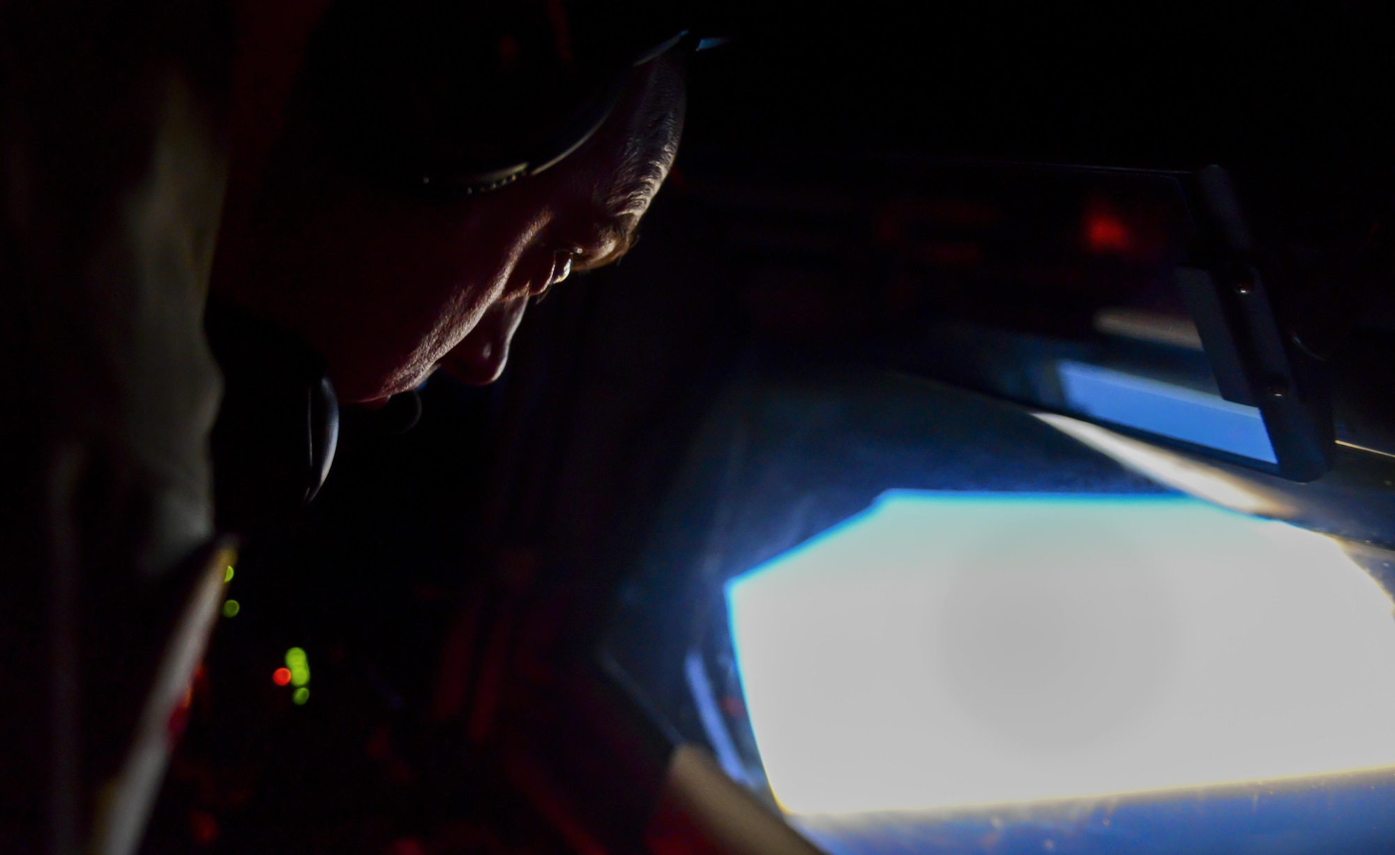 Tech. Sgt. Gerald Sanders, 509th Weapons Squadron Boom Operator, Fairchild Air Force Base, Wash., prepares to refuel an aircraft during Deliberate Strike Night over the Nevada Test and Training Range, June 16, 2016. One of the most important planned aspects of DSN is holding the exercise during hours of darkness. (U.S. Air Force photo by Airman 1st Class Kevin Tanenbaum)