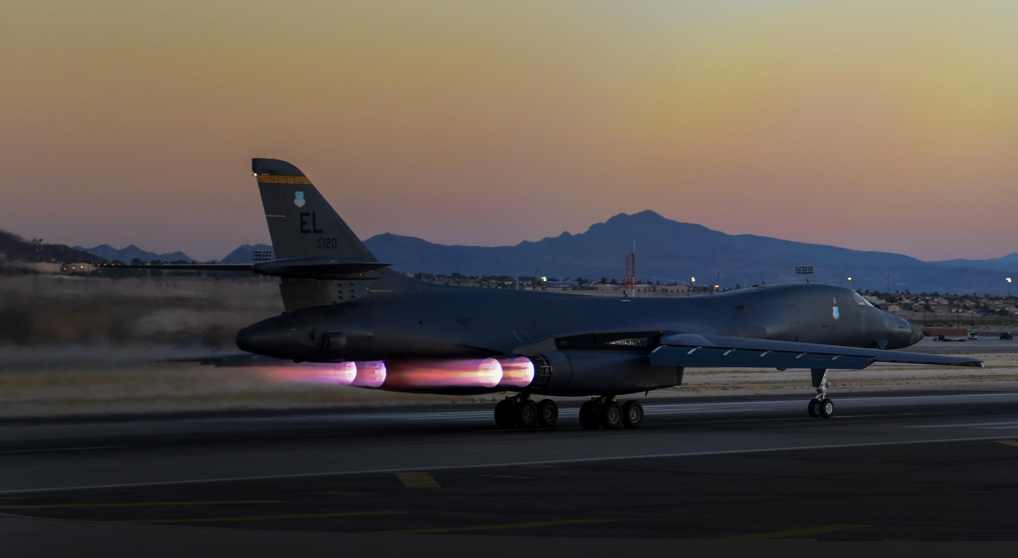 A B-1 Lancer, assigned to the 34th Bomb Squadron, Ellsworth Air Force Base, South Dakota, takes off during Deliberate Strike Night at Nellis Air Force Base, Nevada, June 16, 2016. Composed of six different missions, Advanced Integration contains one of the most dynamic pertaining to fourth and fifth Generation airframes, a night exercise known as Deliberate Strike Night. (U.S. Air Force photo by Airman 1st Class Kevin Tanenbaum) 