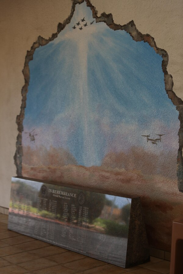 A mural painted by artist Richard DeRosset, a La Jolla, Calif., native and a Navy veteran, frames the War on Terrorism Memorial at the Airmen and Marine Memorial Chapel aboard Marine Corps Air Station Miramar, Calif., May 10. DeRosset donated the mural to the chapel and began work on it April 28. (U.S. Marine Corps photo by Pfc. Liah Kitchen/Released)