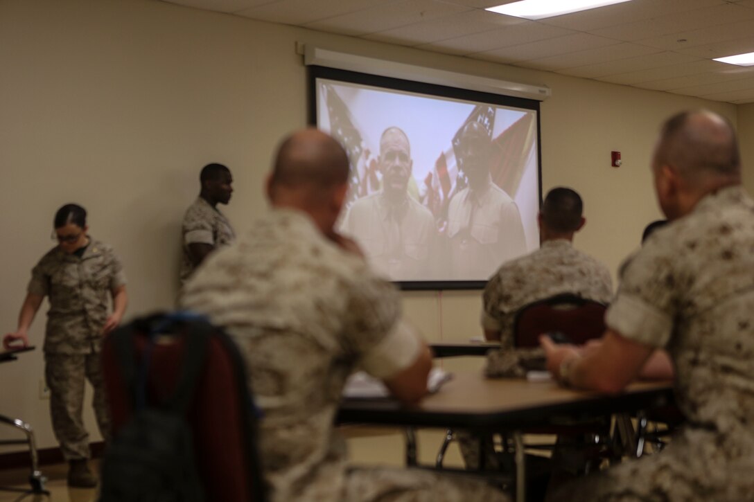The officers listen to the Commandant of the Marine Corps’ intent on female integration during the U.S. Marine Corps Integration Education Plan aboard Marine Corps Air Station Miramar, Calif., June 9. Maj. Misty Posey, plans officer for the Manpower Integration Branch, traveled to various Marine Corps bases to give classes, answer questions and clear misconceptions about females integrating into combat roles. (U.S. Marine Corps photo by Lance Cpl. Harley Robinson/Released)