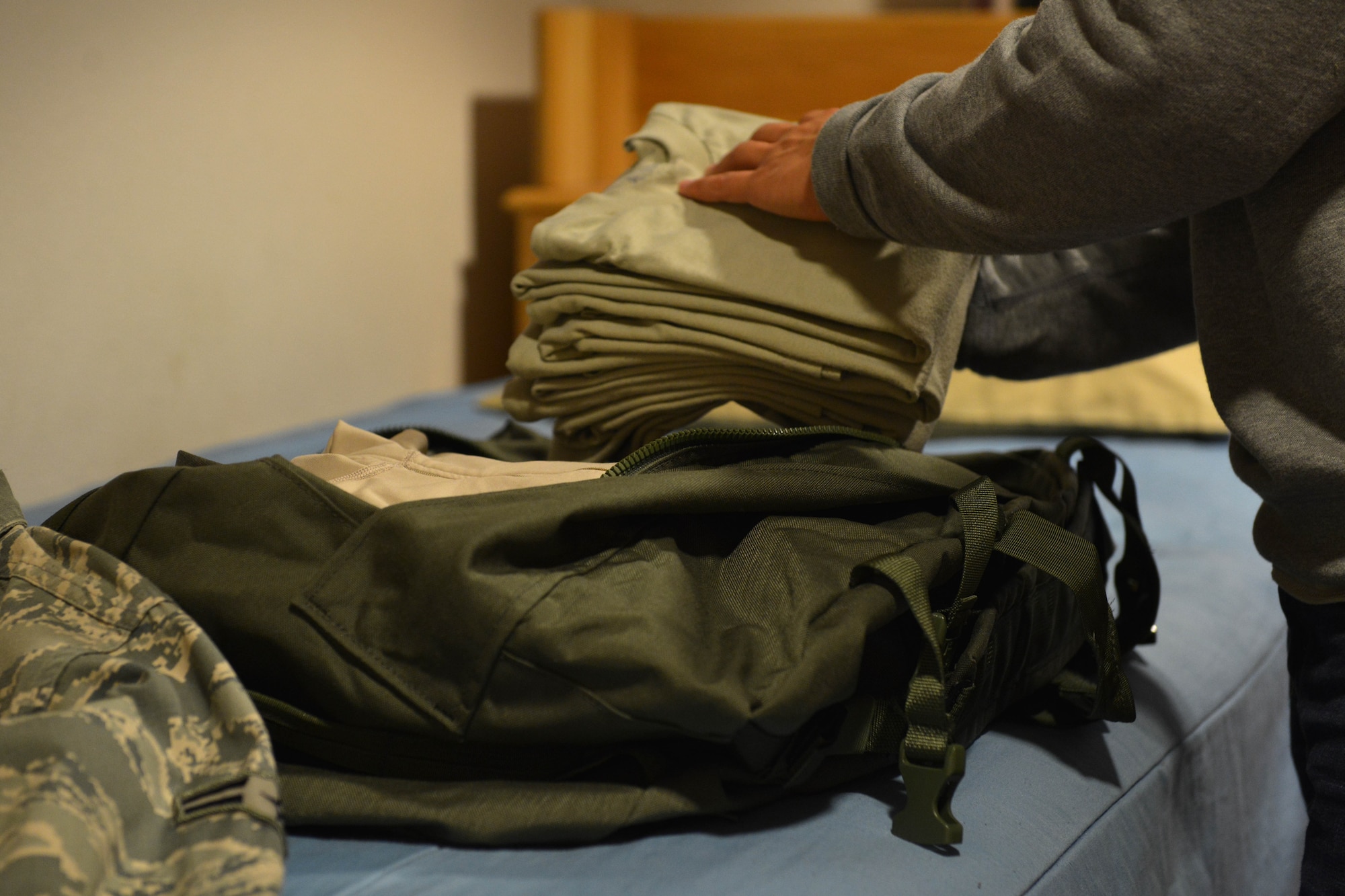 Summer months typically bring an influx of Airmen to Joint base Elmendorf-Richardson, Alaska, allowing some with seniority to move out of the dorms sooner than would normally be allowed, said Air Force Master Sgt. Tammy Miller, 673d Civil Engineer Squadron unaccompanied housing superintendent. Airmen can refer to the Basic Allowance for Housing list outside the dorm leader’s office to see how close they are to moving out. (U.S. Air Force photo by Airman 1st Class Javier Alvarez) 