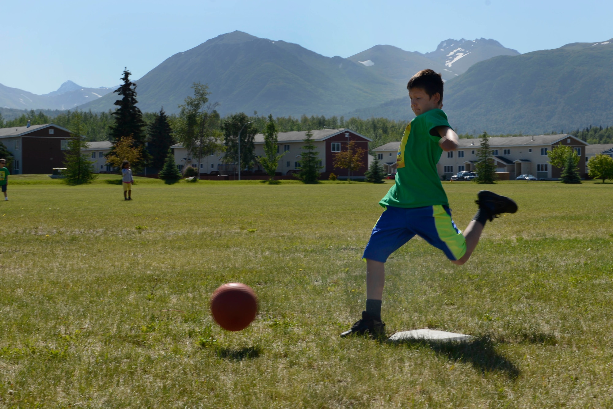 Children play kickball during the Read for the Win summer reading program at the Joint Base Elmendorf-Richardson Library, Alaska, June 16, 2016. All program registrants are eligible to collect a free summer reading shirt. (U.S. Air Force photo by Airman 1st Class Valerie Monroy)