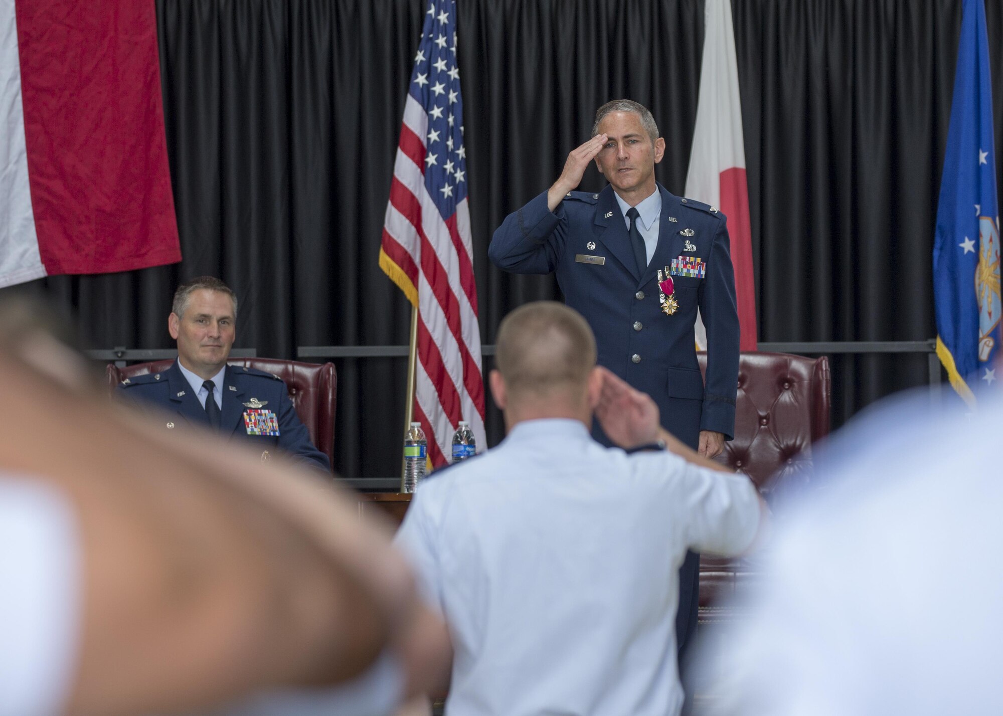 Col. Steven James, 374th Maintenance Group outgoing commander, renders his final salute as commander during a change of command ceremony at Yokota Air Base, Japan, June 20, 2016. (U.S. Air Force photo by Yasuo Osakabe/Released)