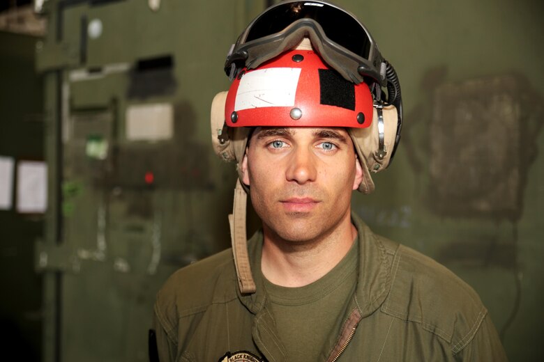 U.S. Marine Corps Sgt. Malcolm Cappelle, a quality assurance safety observer with Marine Fighter Attack Squadron (VMFA) 314, stationed at Marine Corps Air Station Miramar, California, and forward deployed to MCAS Iwakuni, Japan, poses for a photo in front of an ordnance shipping container during exercise Red Flag-Alaska 16-2 at Eielson Air Force Base, Alaska, June 16, 2016. Cappelle just finished preparing ordnance on the squadron’s F/A-18C Hornet fighter jets in support of exercise Red Flag-Alaska 16-2. (U.S. Marine Corps photo by Lance Cpl. Donato Maffin/Released)