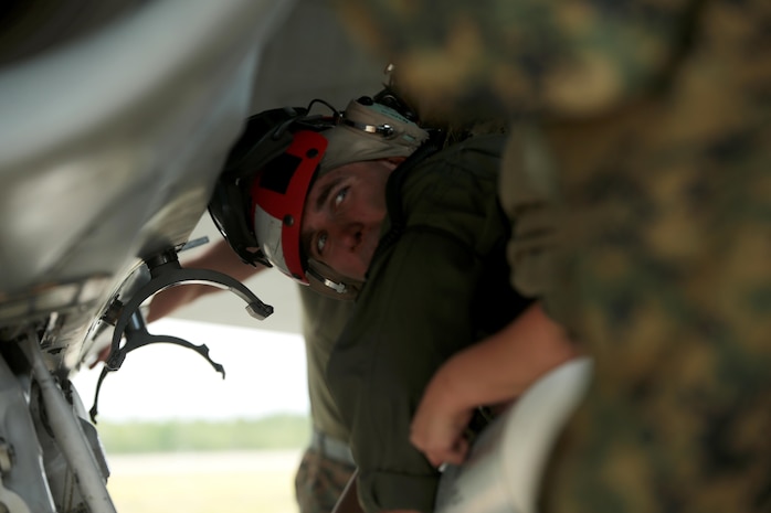 U.S. Marine Corps Sgt. Malcolm Cappelle, a quality assurance safety observer with Marine Fighter Attack Squadron (VMFA) 314, stationed at Marine Corps Air Station Miramar, California, and forward deployed to MCAS Iwakuni, Japan, helps his team carry a CATM 9X training missile during exercise Red Flag-Alaska 16-2 at Eielson Air Force Base, Alaska, June 16, 2016. Cappelle’s team carried and secured ordnance on the squadron’s F/A-18C Hornet fighter jets in support of exercise Red Flag-Alaska 16-2. (U.S. Marine Corps photo by Lance Cpl. Donato Maffin/Released)