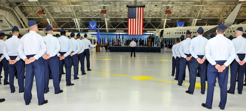 Col. Christopher Thompson, 89th Airlift Wing vice commander, leads the 89th AW in four formations, as they attend the 89th AW change-of-command ceremony at Joint Base Andrews, Md., June 17, 2016. Col. John C. Millard relinquished command to Col. Casey D. Eaton, who will oversee the 89th AW, a combat-ready wing of more than 1,100 Airmen and provides Special Airlift Mission airlift and support to the president, vice president, cabinet members, combatant commanders and other senior military and elected leaders, supporting White House, Air Force chief of staff and Air Mobility Command missions. (U.S. Air Force photo by Senior Master Sgt. Kevin Wallace)