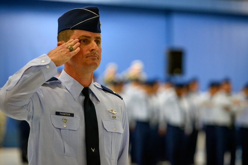 Col. Christopher Thompson, 89th Airlift Wing vice commander, leads the 89th AW in a salute to the new commander, at the 89th AW change-of-command ceremony at Joint Base Andrews, Md., June 17, 2016. Col. John C. Millard relinquished command to Col. Casey D. Eaton, who will oversee the 89th AW, a combat-ready wing of more than 1,100 Airmen and provides Special Airlift Mission airlift and support to the president, vice president, cabinet members, combatant commanders and other senior military and elected leaders, supporting White House, Air Force chief of staff and Air Mobility Command missions. (U.S. Air Force photo by Senior Master Sgt. Kevin Wallace)
