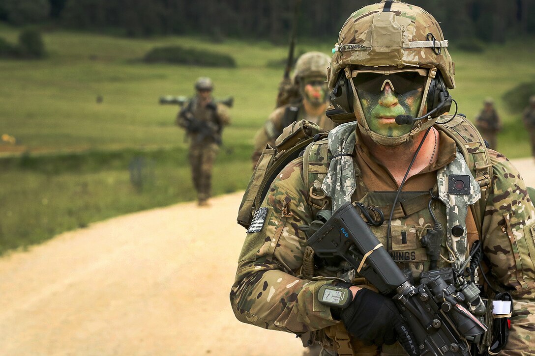 Army 1st Lt. Jennings, foreground, moves out with his team members to their next objective after an airborne operation during Swift Response16, in Hohenfels, Germany, June 15, 2016. Jennings is assigned to the 82nd Airborne Division's 1st Brigade Combat Team. Army photo by Sgt. Juan F. Jimenez


