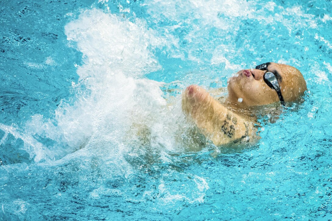 Army veteran Matthew Lammers competes in a backstroke event during the 2016 Department of Defense Warrior Games at the U.S. Military Academy in West Point, N.Y., June 20, 2016. DoD photo by EJ Hersom