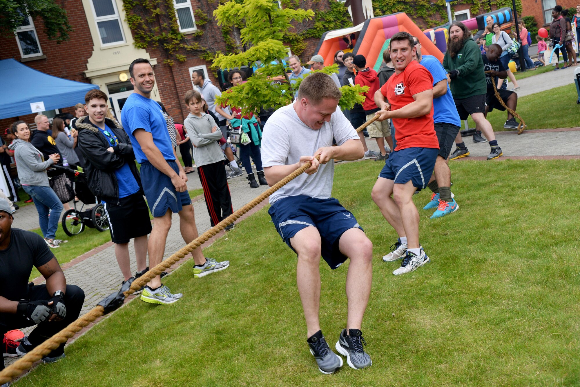 Team Mildenhall Airmen compete in a tug-of-war competition during the Marauder Melee event June 16, 2016, on RAF Mildenhall, England. Marauder Melee was a sports competition between squadrons throughout the installation. (U.S. Air Force photo by Airman 1st Class Tenley Long/Released)