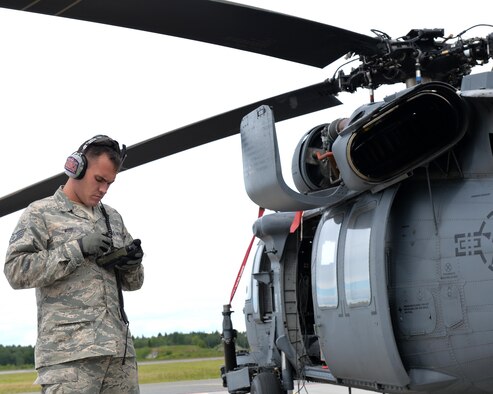 Staff Sgt. Barry Wood, 106th Maintenance Group, inspects a backup radio antenna June 11, 2016 at Amari Air Base, Estonia during the unfolding of a U.S. Air Force HH-60 Pave Hawk helicopter as part of Saber Strike 16. Saber Strike is a multinational exercise that tests the capabilities of various aspects of the militaries involved. (U.S. Air National Guard photo/Staff Sgt. Blake Mize/released)