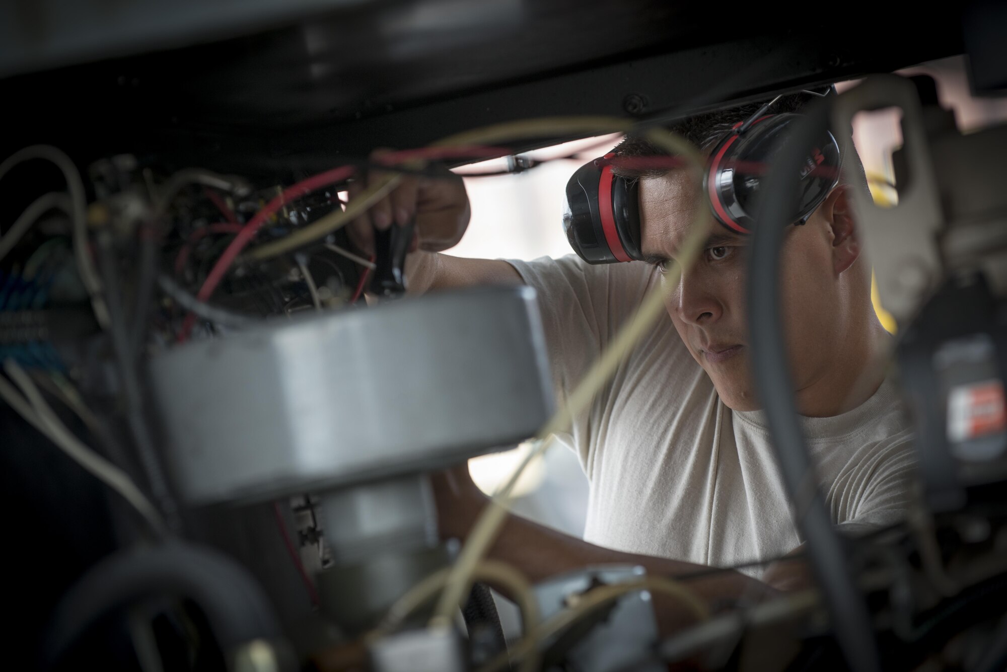 Staff Sgt. Jade McGill, 31st Maintenance Squadron aerospace ground equipment craftsman, services an air compressor unit June 20, 2016, at Aviano Air Base, Italy. Compressor units and other 31st MXS equipment will accompany the 555th Fighter Squadron to Nellis Air Base, Nevada, in support of Exercise Red Flag 16-3. (U.S. Air Force photo by Airman 1st Class Cory W. Bush/Released)