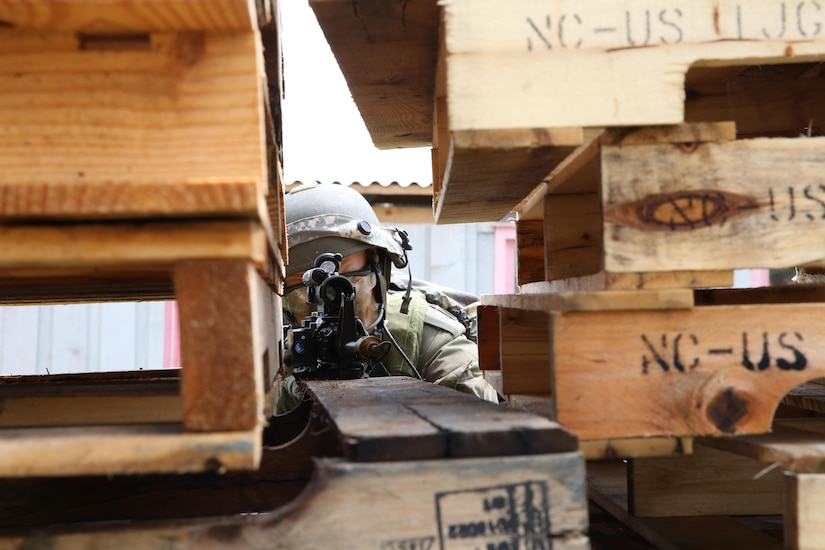 A Dutch soldier assigned to Charlie Company, 11th Infantry Battalion, 11th Airmobile Brigade scans his sector while conducting a town assault scenario during the Swift Response 16 training exercise at the Hohenfels Training Area in Hohenfels, Germany, June 17, 2016. The exercise is one of the premier military crisis response training events in the world for multinational airborne forces. Deputy Defense Secretary Bob Work met with Dutch Defense Minister Secretary-General Wim Geerts at the Pentagon June 21, where the two leaders discussed mutual security issues. Army photo by Staff Sgt. Nathaniel Allen