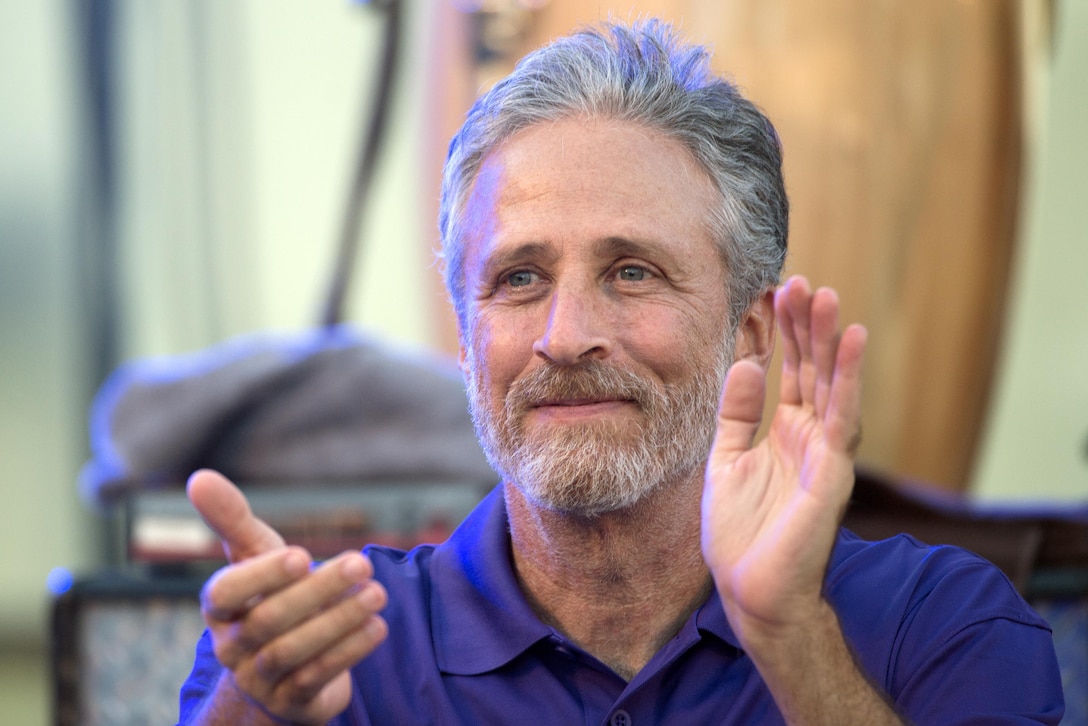 Comedian Jon Stewart applauds the athletes who participated in the 2016 Department of Defense Warrior Games during the closing ceremony at the U.S. Military Academy in West Point, N.Y., June 21, 2016. DoD photo by EJ Hersom