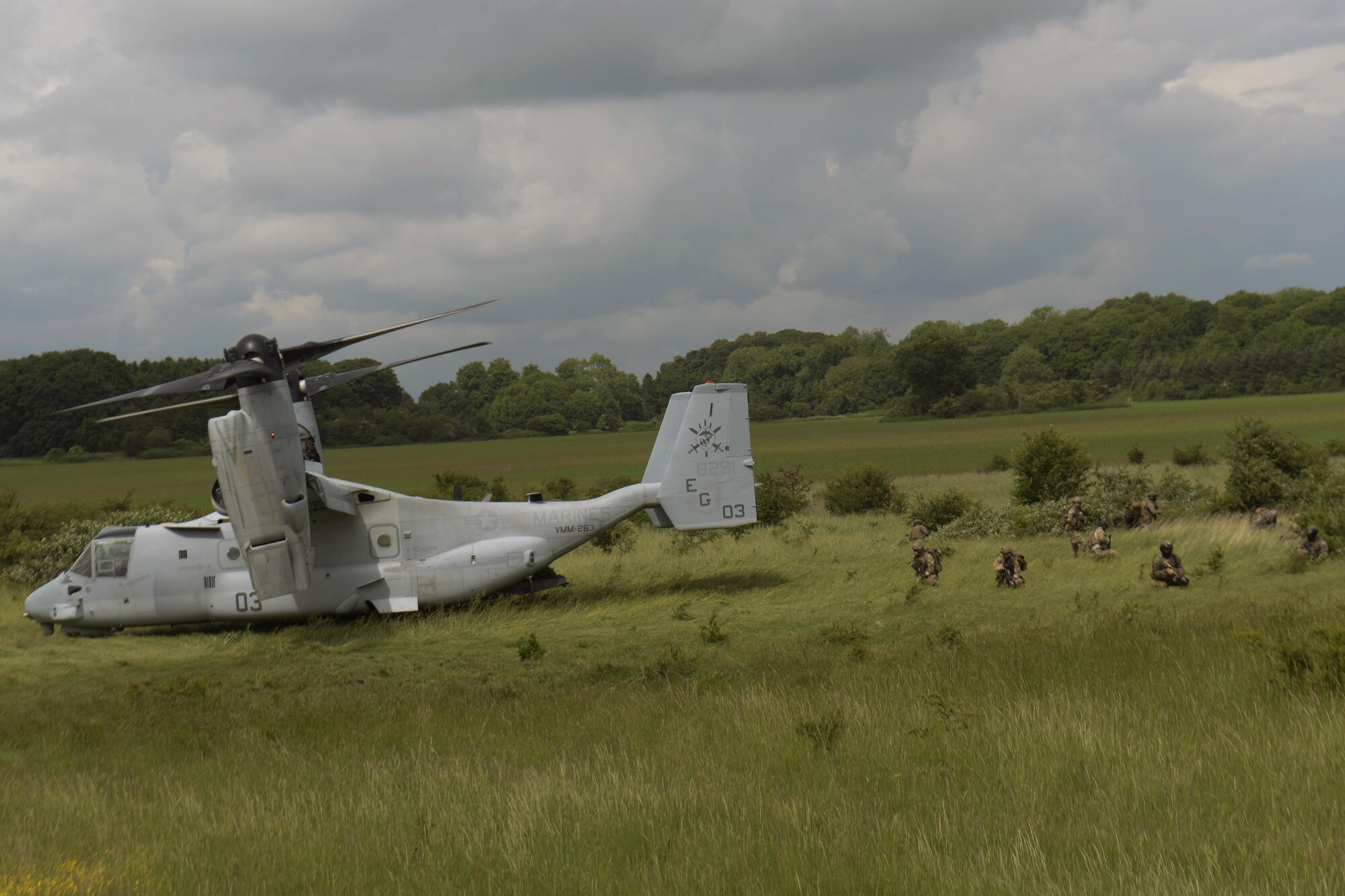 An MV-22 Osprey prepares to depart after dropping off U.S. Marines assigned to the Special-Purpose Marine Air-Ground Task Force Crisis Response Africa unit at Stanford Training Area, England, June 14. The training enabled 57th Rescue Squadron pararescuemen and the Marines to cohesively work together in a training environment to provide insight on how each service operates downrange. (U.S. Air Force photo/Airman 1st Class Abby L. Finkel)