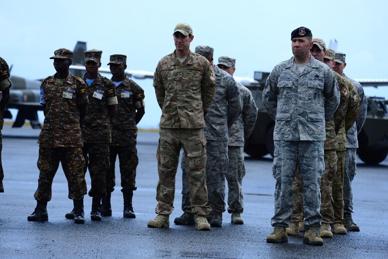 African Partnership Flight participants stand in formation during the event’s opening ceremony at Laikipia Air Base, Kenya, June 21, 2016. More than 50 U.S. Air Force Airmen participated in the first African Partnership Flight in Kenya. The APF is designed for U.S. and African partner nations to work together in a learning environment to help build expertise and professional knowledge and skills. (U.S. Air Force photo by Tech. Sgt. Evelyn Chavez/Released)