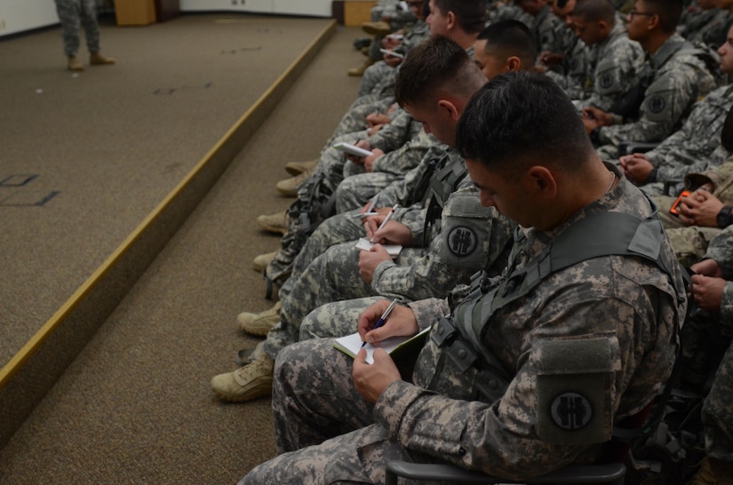 Roughly 200 U.S. Army Reserve and Canadian military police Soldiers receive an information brief on Guardian Justice before beginning training operations at Fort McCoy, Wisc., June 20, 2016. Guardian Justice is a military police exercise that focuses on detention operations and combat support. (U.S. Army photo by Spc. Adam Parent)