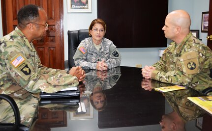 Maj. Gen. A.C. Roper, (L) commander of the 80th Training Command, Maj. Gen. Marta Carcana the adjutant general of the Puerto Rico National Guard, and Col. Albert Morris (L) commander, 5th Brigade 94th Training Division, discuss the ongoing relationship between the Puerto Rico National Guard and the brigade, which is subordinate to the 80th TC