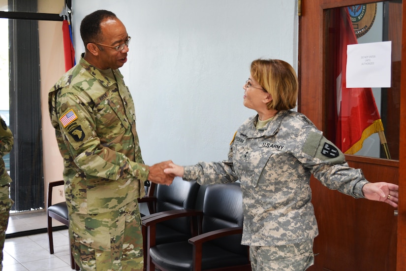 Maj. Gen. Marta Carcana the adjutant general of the Puerto Rico National Guard, greets Maj. Gen. A.C. Roper, commander of the 80th Training Command, at Fort Allen, Puerto Rico March 10, 2016. Roper met with Carcana to discuss the ongoing relationship between the Puerto Rico National Guard and 5th Brigade 94th Training Division, an 80th TC subordinate unit.