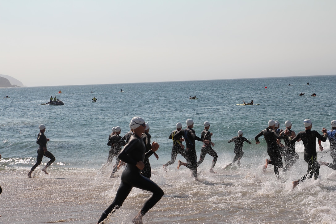 Racers charge into the Pacific Ocean to kick off the 2016 Armed Forces Triathlon Championship was held at Naval Base Ventura County, Calif. on 18 June.  Army swept the men and women team titles.