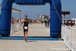 Navy Lt. Kyle Hooker of NAS Jacksonville, Fla. won his second straight Armed Forces individual gold medal and led Navy to team silver.  The 2016 Armed Forces Triathlon Championship was held at Naval Base Ventura County, Calif. on 18 June.  