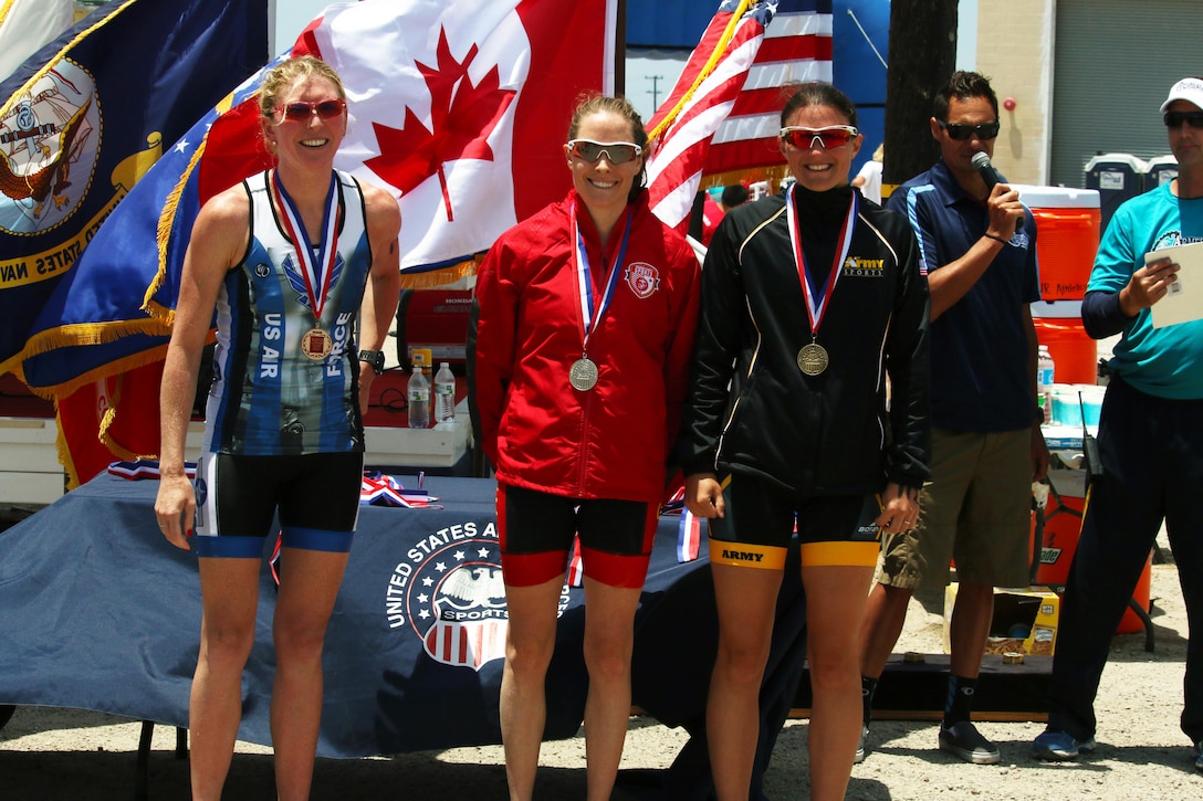 Your 2016 Armed Forces Triathlon Championship Women Medalists from left to right:  Gold medalist Air Force Maj Judith Coyle of Joint Base Lewis-McChord, Wash.; Silver medalist Marine 1st Lt. Mollie Hebda of Camp Pendleton, Calif.; and Bronze medalists Army Capt. Samone Franzese of Fort Bragg, N.C.  The 2016 Armed Forces Triathlon Championship was held at Naval Base Ventura County, Calif. on 18 June.  