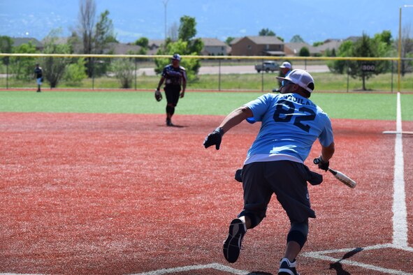 Miguel Aguilar, 82nd Force Support Squadron, hits a shot to the left side at a military softball tournament in Colorado, June 13, 2016. The Sheppard Senators, Sheppard Air Force Base's men's varsity softball team ranks first out of 57 Varsity 'B' military teams from around the country.