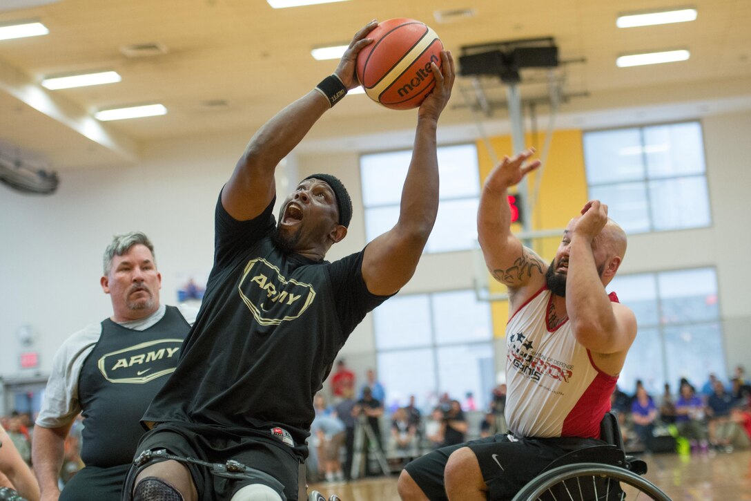 Army veteran Alexander Shaw grabs a rebound during the basketball gold medal round of the 2016 Department of Defense Warrior Games at the U.S. Military Academy in West Point, N.Y., June 21, 2016. DoD photo by EJ Hersom