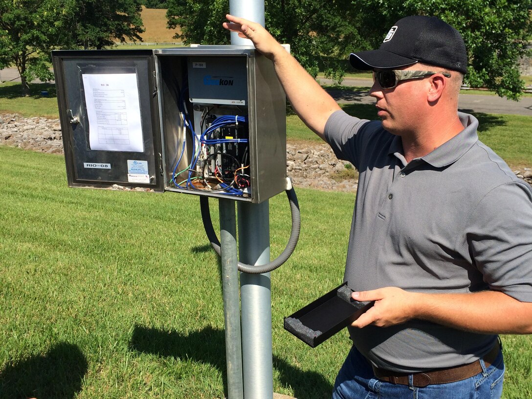 Jason Anderson, U.S. Army Corps of Engineers St. Louis District, shows off the automate instrumentation at J. Percy Priest Dam in Nashville, Tenn., June 16, 2016.