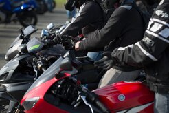 Riders don their safety gear before heading out for a ride at Joint Base Elmendorf-Richardson, Alaska. Personal protective equipment is one of the ways to stay safe while riding. 