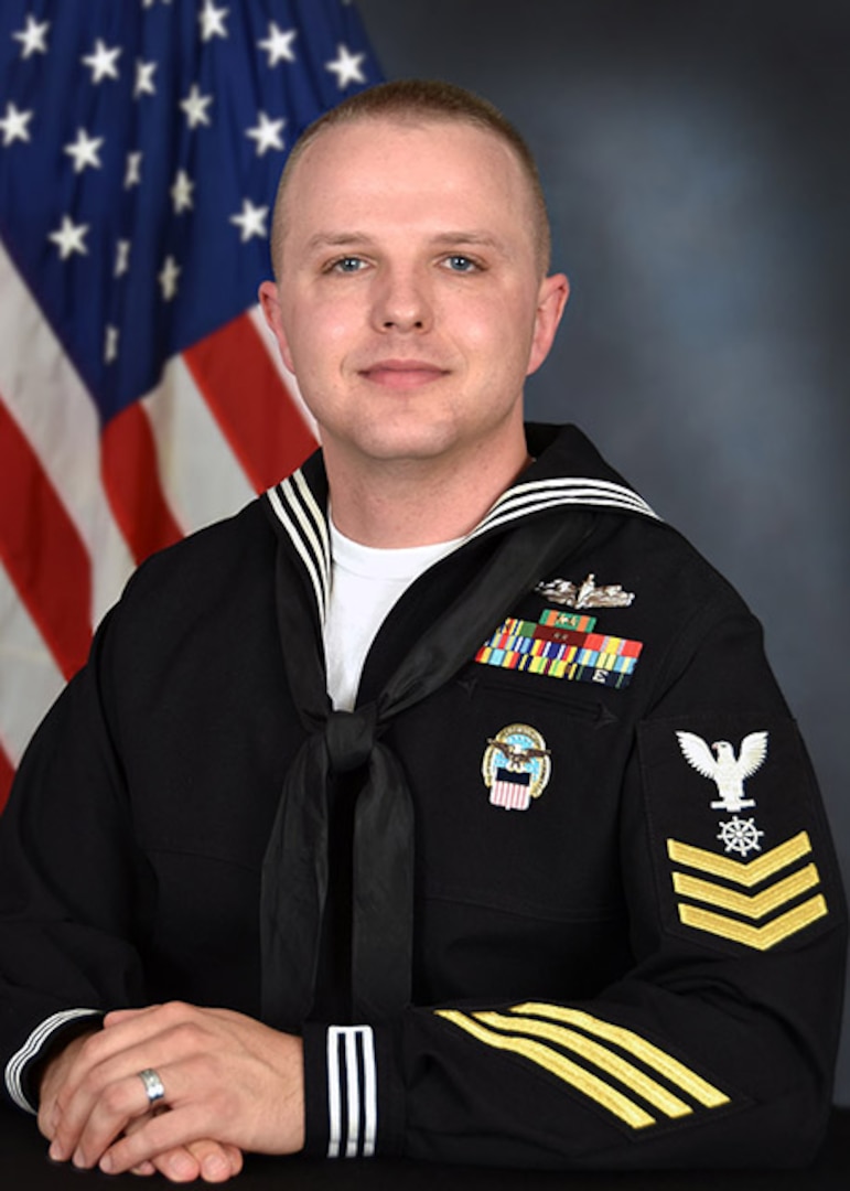 Defense Logistics Agency Aviation's Navy Petty Officer 1st Class Zachary Corallo, inventory manager, Mapping Division, Customer Operations Directorate, speaks to employees on serving openly and  how “Don't ask, Don't tell” affected his life during the Lesbian, Gay, Bisexual and Transgender Pride Month event held June 15, 2016 in the Lott's Conference Center on Defense Supply Center Richmond, Virginia. 

