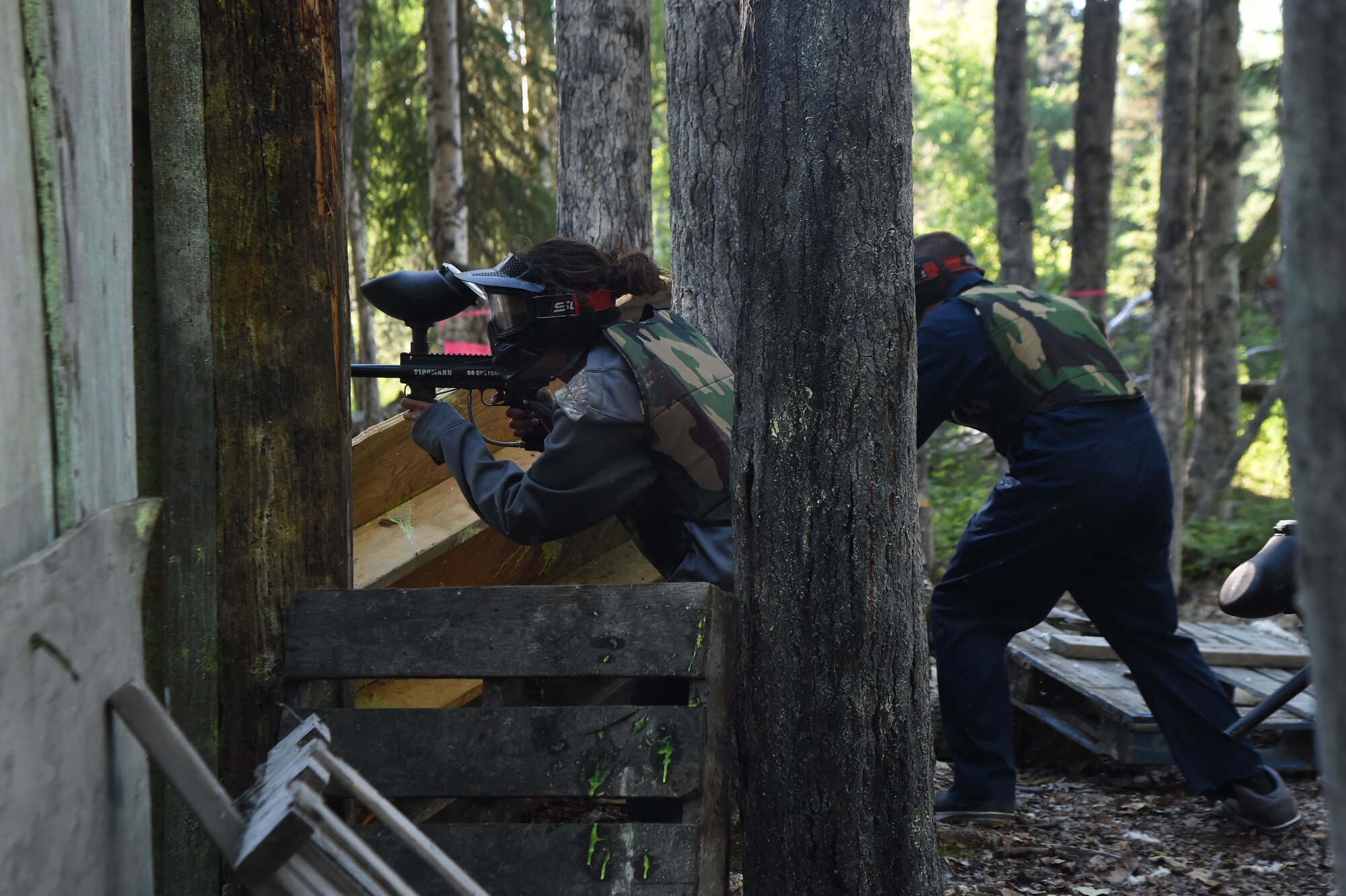 Airmen and Soldiers compete in a paintball tournament  during the 2016 Arctic Warrior Olympics at Joint Base Elmendorf-Richardson, Alaska, June 17, 2016. The Arctic Warrior Olympics originated in 1982, when Airmen at Elmendorf Air Force Base initiated Airman Day to promote camaraderie and good health. Then in 1986, it became known as Elmendorf Field Day. It was renamed the Arctic Warrior Olympics in 1989 and is hosted in conjunction with the Military Appreciation Picnics. (U.S. Air Force photo by Airman 1st Class Valerie Monroy)