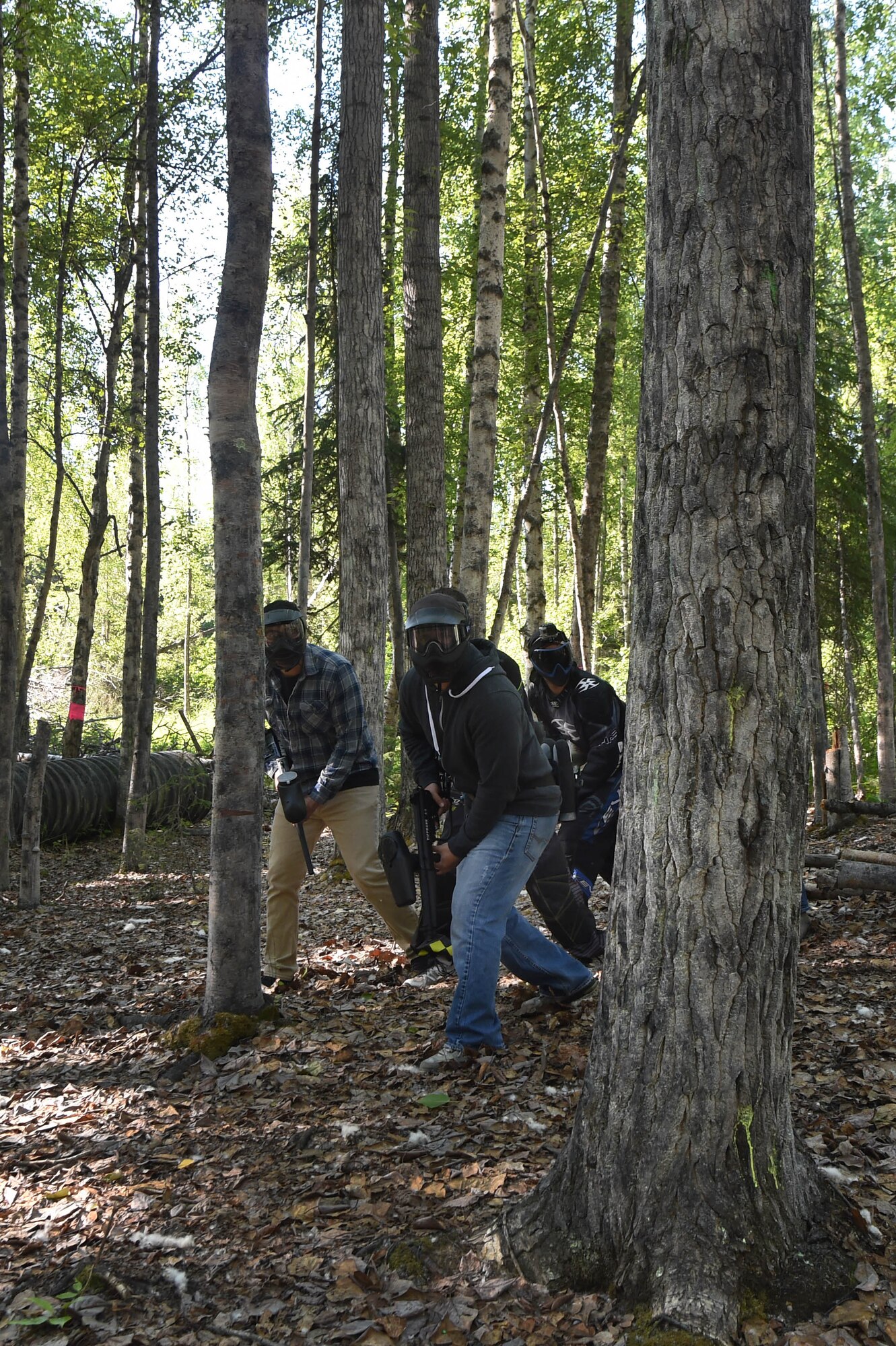 Airmen and Soldiers compete in a paintball tournament  during the 2016 Arctic Warrior Olympics at Joint Base Elmendorf-Richardson, Alaska, June 17, 2016. The Arctic Warrior Olympics originated in 1982, when Airmen at Elmendorf Air Force Base initiated Airman Day to promote camaraderie and good health. Then in 1986, it became known as Elmendorf Field Day. It was renamed the Arctic Warrior Olympics in 1989 and is hosted in conjunction with the Military Appreciation Picnics. (U.S. Air Force photo by Airman 1st Class Valerie Monroy)