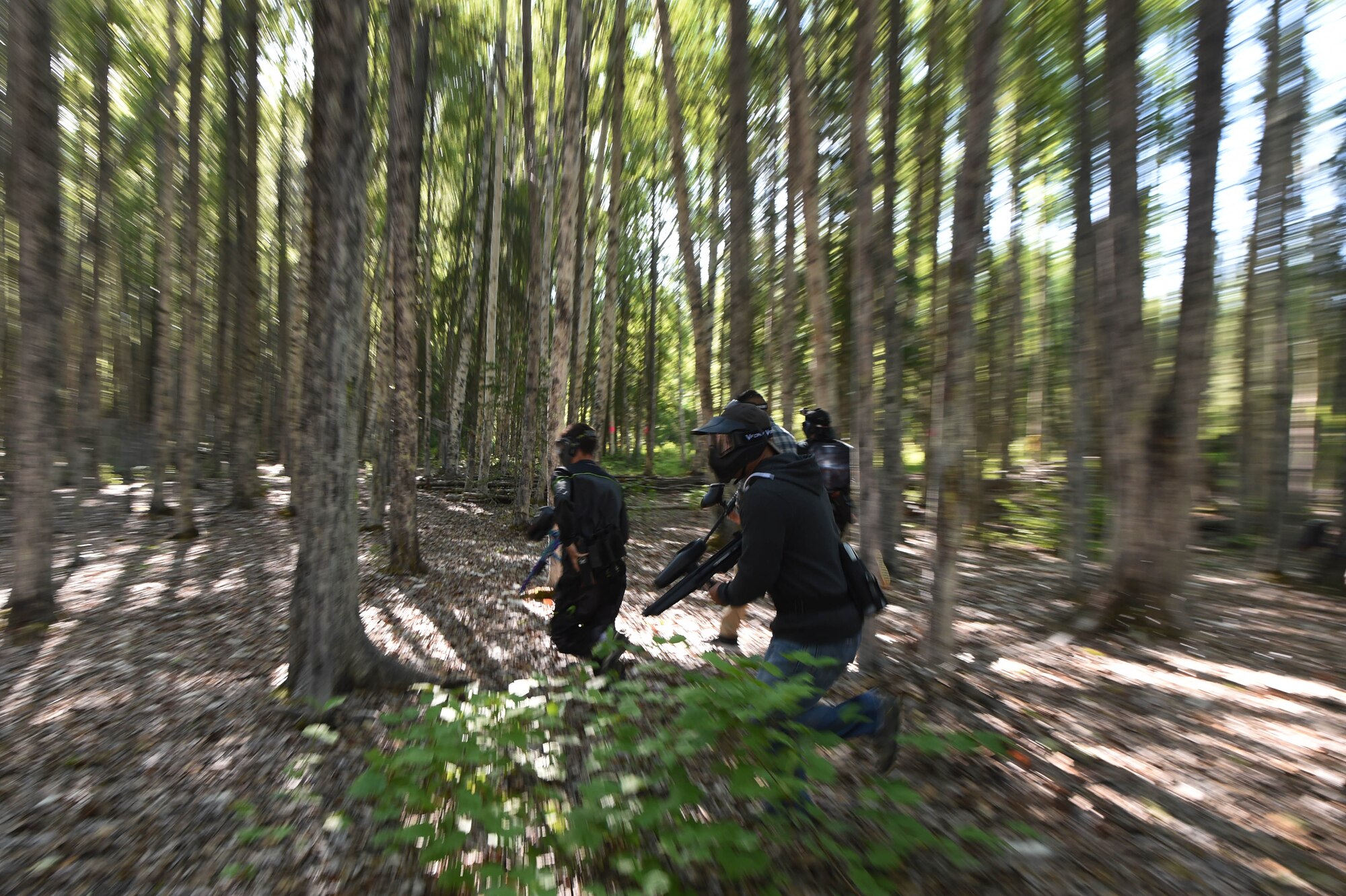 Airmen and Soldiers compete in a paintball tournament  during the 2016 Arctic Warrior Olympics at Joint Base Elmendorf-Richardson, Alaska, June 17, 2016. The Arctic Warrior Olympics originated in 1982, when Airmen at Elmendorf Air Force Base initiated Airman Day to promote camaraderie and good health. Then in 1986, it became known as Elmendorf Field Day. It was renamed the Arctic Warrior Olympics in 1989 and is hosted in conjunction with the Military Appreciation Picnics. (U.S. Air Force photo by Airman 1st Class Valerie Monroy)