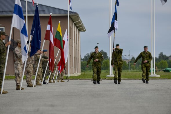 Estonian soldiers present the colors during the closing ceremony for Saber Strike 16 at Tapa Training Base, Estonia, June 21, 2016. U.S. forces in Europe participated in Saber Strike 16; a long-standing, U.S. Joint Chiefs of Staff-directed, U.S. Army Europe-led cooperative-training exercise, which has been conducted annually since 2010.  This year’s exercise focused on promoting interoperability with allies and regional partners. The United States has enduring interests in supporting peace and prosperity in Europe and bolstering the strength and vitality of NATO, which is critical to global security. (U.S. Air Force photo/Senior Airman Nicole Keim)