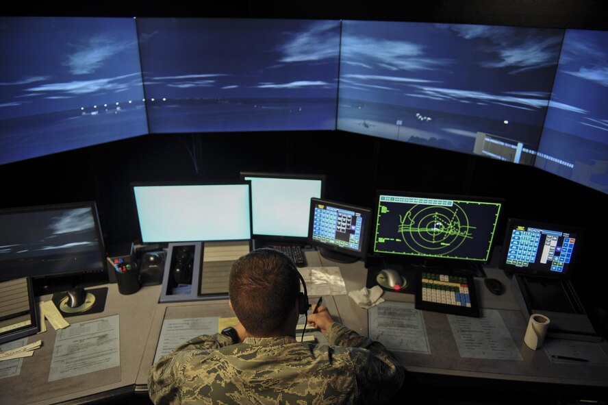 Airman 1st Class Kamden Sokeland, an air traffic control apprentice, conducts training on a virtual control tower at Hurlburt Field, Fla., June 17, 2016. Air traffic controllers provide a safe, orderly and expeditious flow of aircraft on the flightline and in the air. (U.S. Air Force photo by Airman 1st Class Joseph Pick)