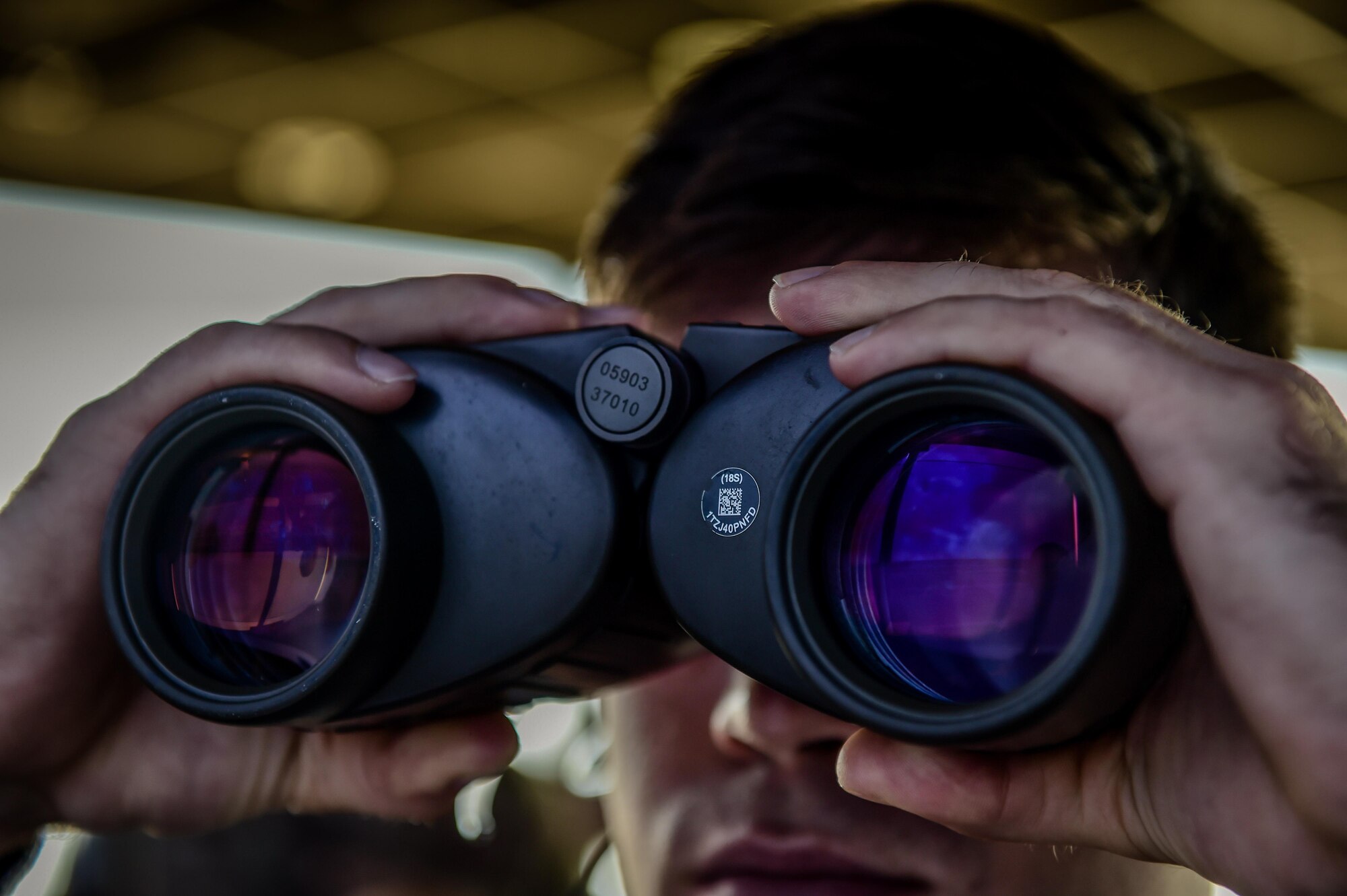 Airman 1st Class Hollis Read, an air traffic control apprentice with the 1st Special Operations Support Squadron, monitors aircraft movement at Hurlburt Field, Fla., June 17, 2016. Air traffic controllers enable a safe, orderly and expeditious flow of aircraft on the flightline and in the air. (U.S. Air Force photo by Staff Sgt. Christopher Callaway)