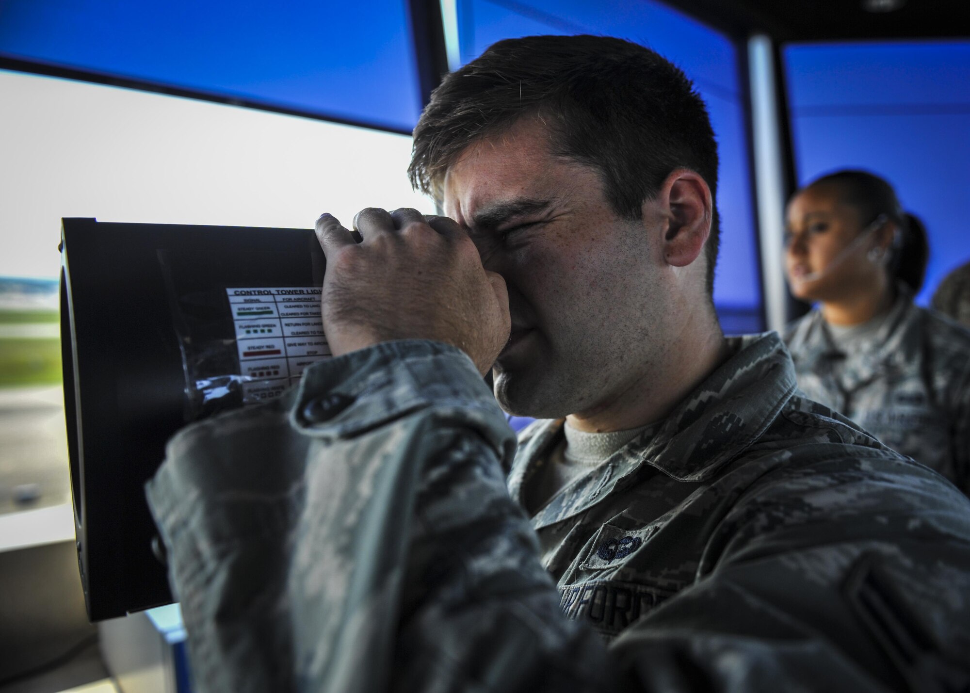 Airman 1st Class Hollis Read, an air traffic controller with the 1st Special Operations Support Squadron, operates a light gun at Hurlburt Field, Fla., June 17, 2016. A light gun is used to direct traffic in the air and on the ground when radio communications are unavailable. (U.S. Air Force photo by Airman 1st Class Joseph Pick)