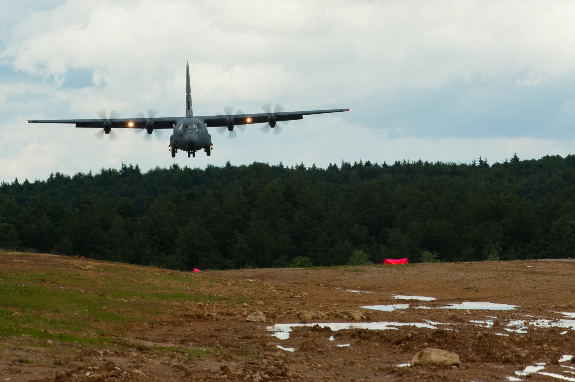 A U.S. Air Force C-130J Super Hercules aircraft from Little Rock Air Force Base, Ark., lands during Exercise Swift Response 16 at Hohenfels Training Area, Germany, June 17, 2016. Exercise SR16 is one of the premier military crisis response training events for multinational airborne forces in the world, the exercise has more than 5,000 participants from 10 NATO nations. (U.S. Air Force photo by Master Sgt. Joseph Swafford/Released) 

