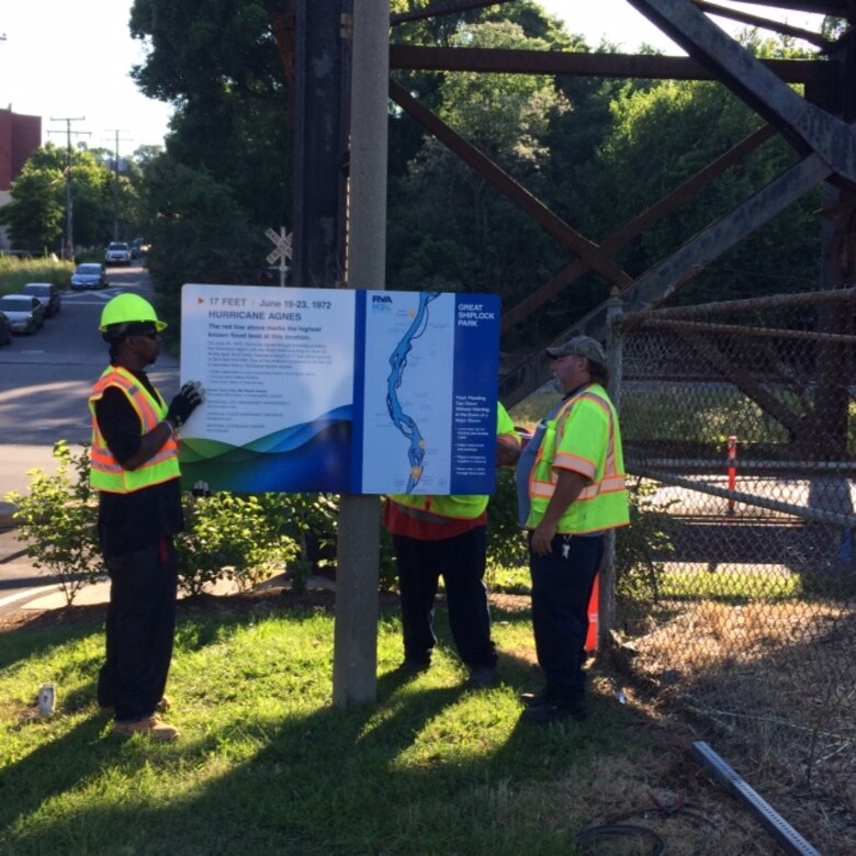 City of Richmond, Virginia work crews install high water mark signs around the city marking the height of historic flood waters as part of the High Water Mark Initiative. The  initiative was developed in partnership with Venture Richmond and the Virginia Silver Jackets and includes the Virginia Department of Conservation and recreation, Virginia Department of Conservation and Recreation, Virginia Department of Emergency Management, Federal Emergency Management Agency High Water Mark Initiative and Region III, National Weather Service Weather Forecast Office Wakefield, U.S. Geological Survey Water Science Center and the U.S. Army Corps of Engineers, Norfolk District to promote flood awareness within the city. 