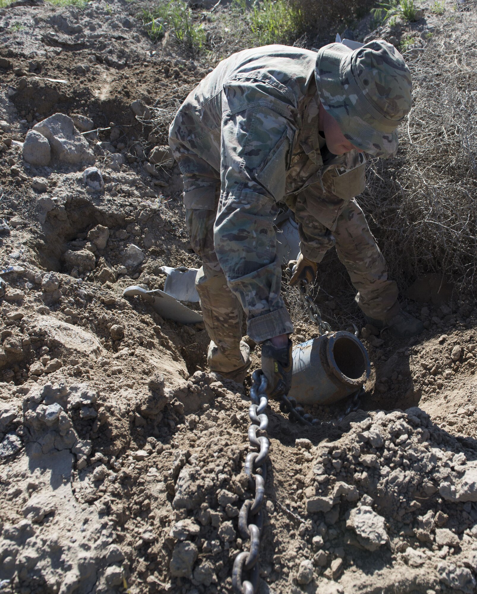 An explosive ordnance disposal member from the 366th Civil Engineer Squadron prepares an inert GBU-12 Paveway II for extraction during a range clearance at Saylor Creek Range Complex, Idaho, May 9, 2016. There are approximately 97,000 acres of Air Force owned, joint-use land around Saylor Creek Range where public access is permitted.
(U.S. Air Force photo by Airman 1st Class Chester Mientkiewicz/Released)